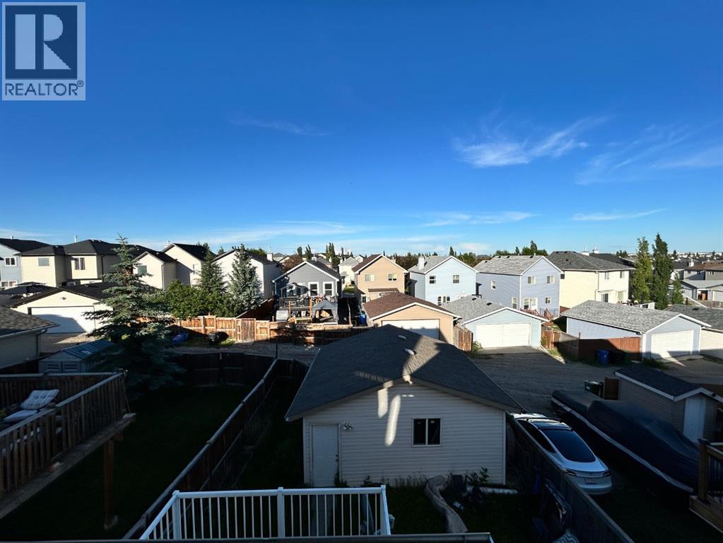 86 Covepark Road, Calgary, Alberta  T3K 6B9 - Photo 4 - A2330032