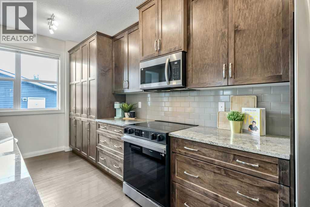 59 Ravenskirk Heath SE, Airdrie, Alberta  T4A 0K7 - Photo 13 - A2331251