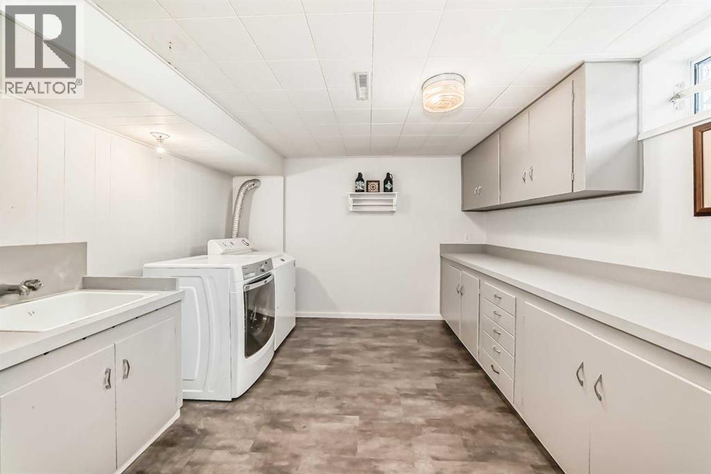 8043 Elbow Drive SW, Calgary, Alberta  T2V 1K5 - Photo 42 - A2327878