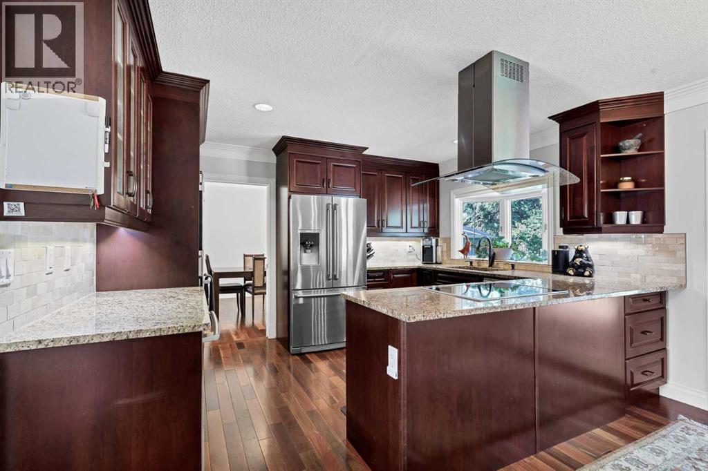 10907 Willowfern Drive SE, Calgary, Alberta T2J 1R6 - Photo 9 - A2329538