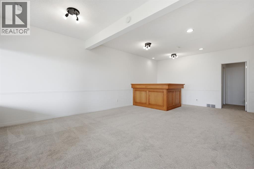 1 Gleneagles View, Cochrane, Alberta  T4C 1N9 - Photo 33 - A2330336