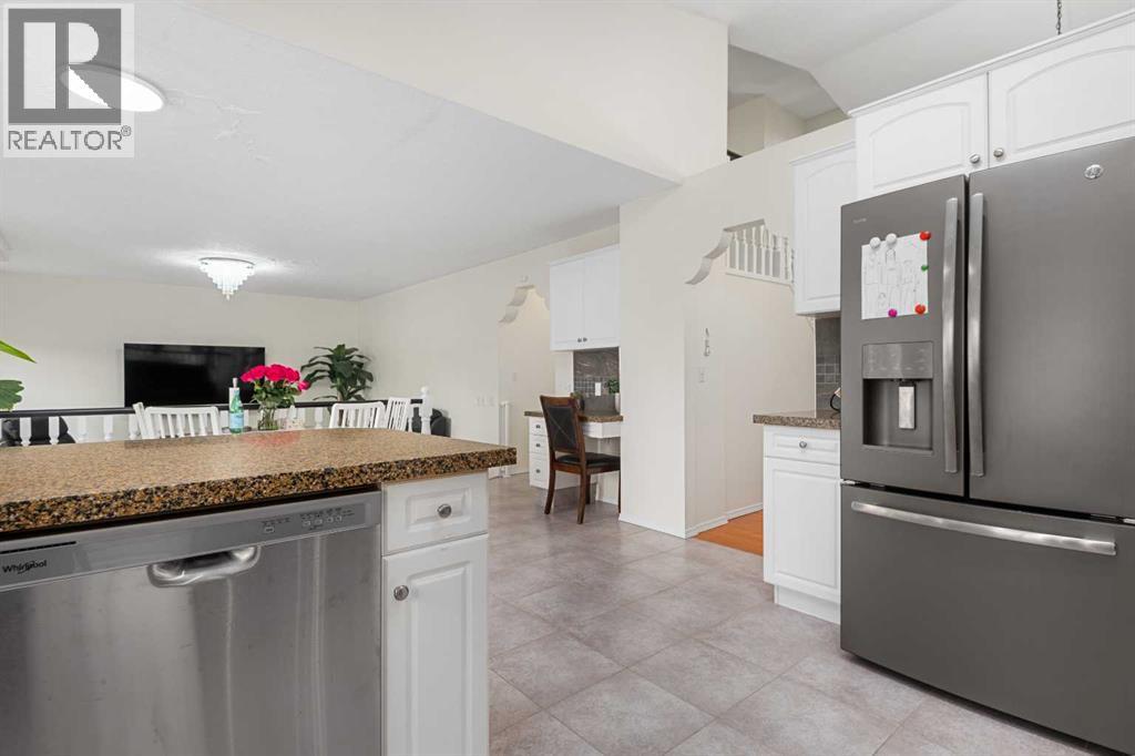 704 Woodside Drive NW, Airdrie, Alberta  T4B 2G9 - Photo 17 - A2321781
