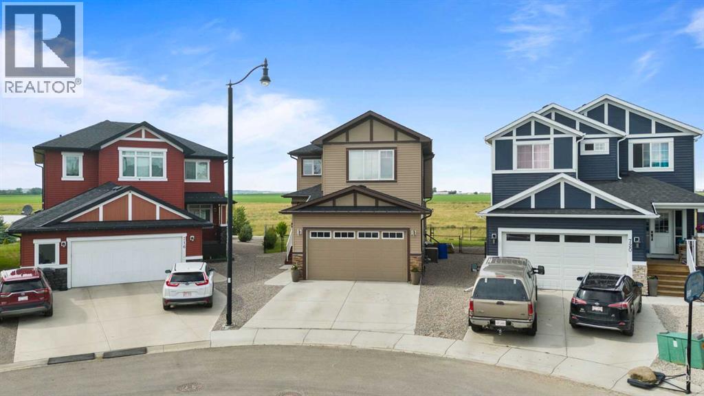 718 Hampshire Cove NE, High River, Alberta  T1V 0E6 - Photo 3 - A2331590
