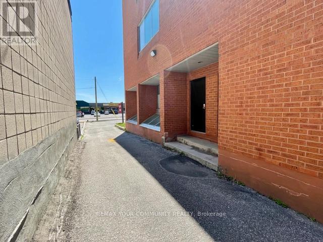 100 G - 107 Holland Street, Bradford West Gwillimbury, Ontario  L9N 1C3 - Photo 3 - N12483159