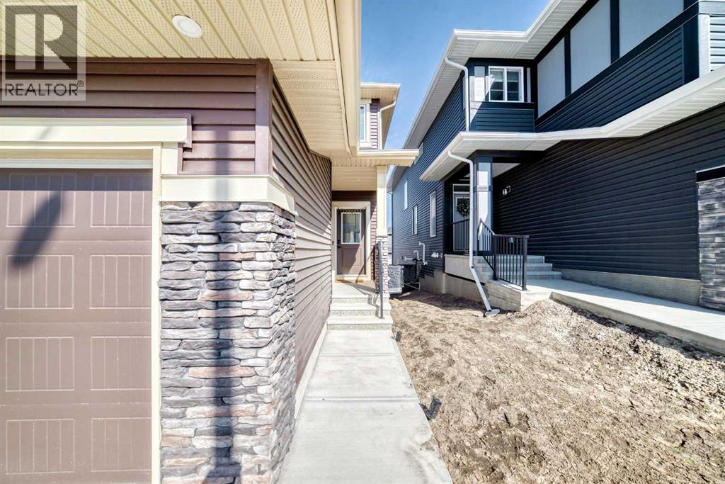 287 Amblehurst Way NW, Calgary, Alberta  T3P 2J8 - Photo 3 - A2308386