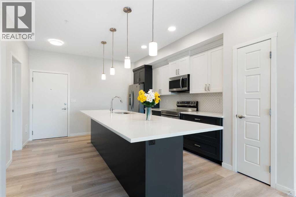 305, 200 Harvest Hills Place NE, Calgary, Alberta  T3K 2N3 - Photo 7 - A2328952