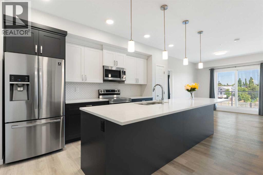 305, 200 Harvest Hills Place NE, Calgary, Alberta  T3K 2N3 - Photo 1 - A2328952