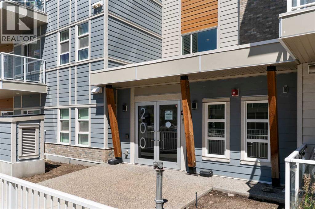 305, 200 Harvest Hills Place NE, Calgary, Alberta  T3K 2N3 - Photo 3 - A2328952
