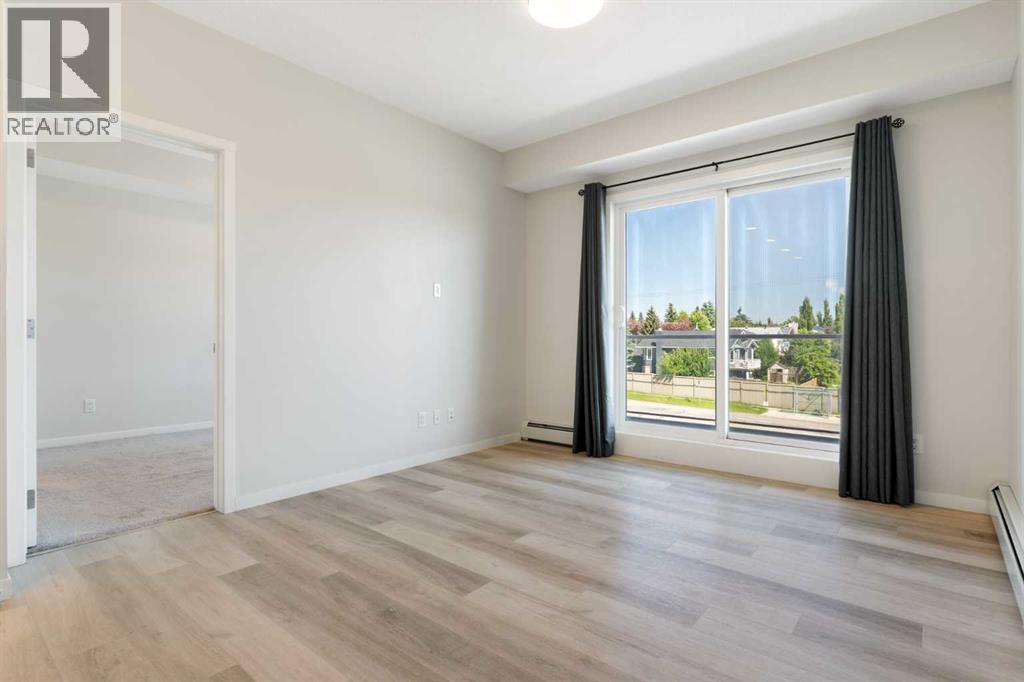 305, 200 Harvest Hills Place NE, Calgary, Alberta  T3K 2N3 - Photo 12 - A2328952