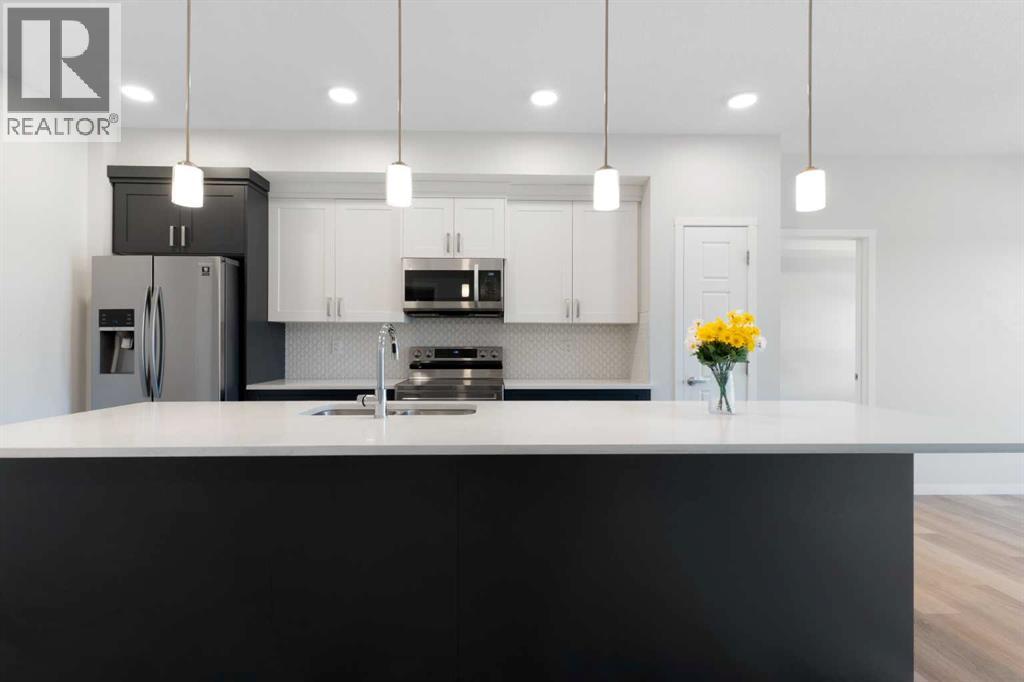 305, 200 Harvest Hills Place NE, Calgary, Alberta  T3K 2N3 - Photo 6 - A2328952