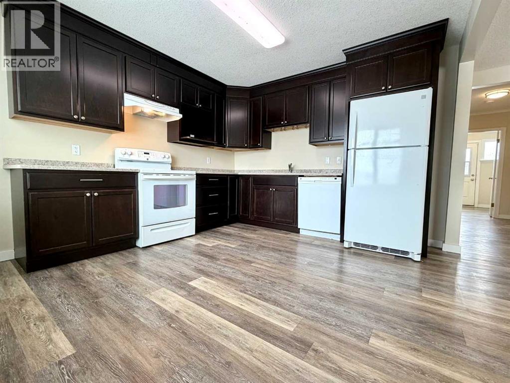 830 6 Avenue, Wainwright, Alberta  T9W 1C2 - Photo 6 - A2306027