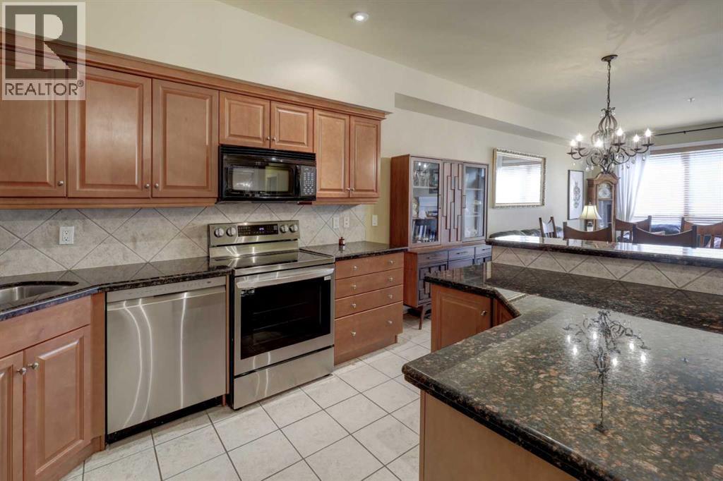 105, 11642 Valley Ridge Park Nw, Calgary, Alberta  T3B 5Z5 - Photo 3 - A2329477