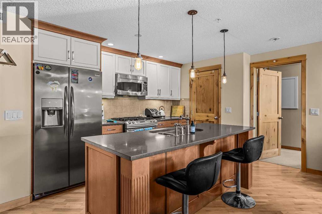 302, 2100a Stewart Creek Drive, Canmore, Alberta  T1W 0G3 - Photo 6 - A2308951