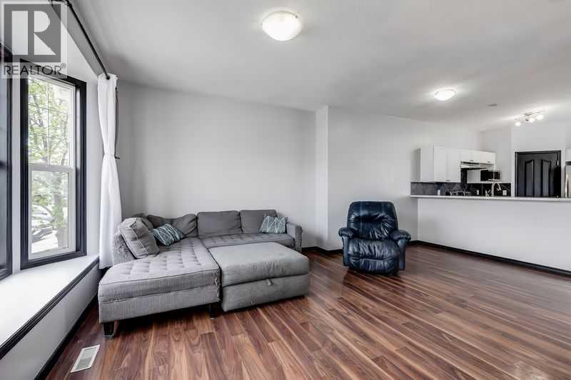 1001, 703 Luxstone Square Se, Airdrie, Alberta  T4B 0A4 - Photo 3 - A2311177