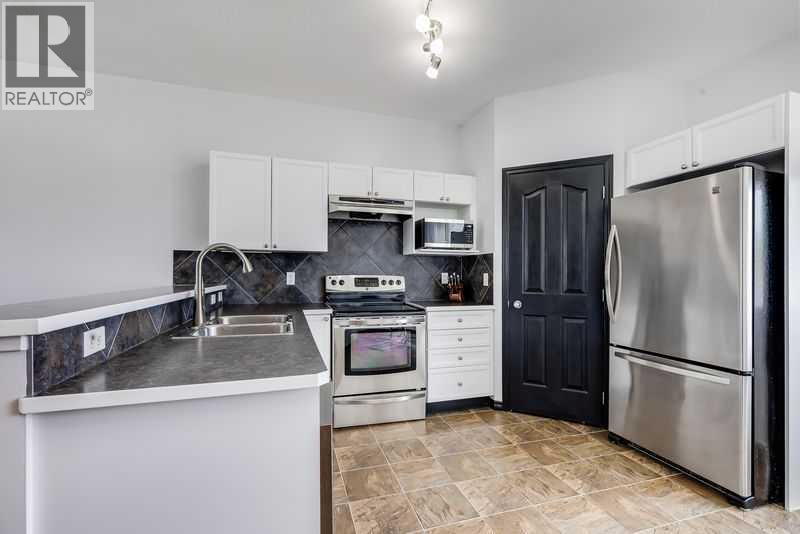 1001, 703 Luxstone Square Se, Airdrie, Alberta  T4B 0A4 - Photo 6 - A2311177