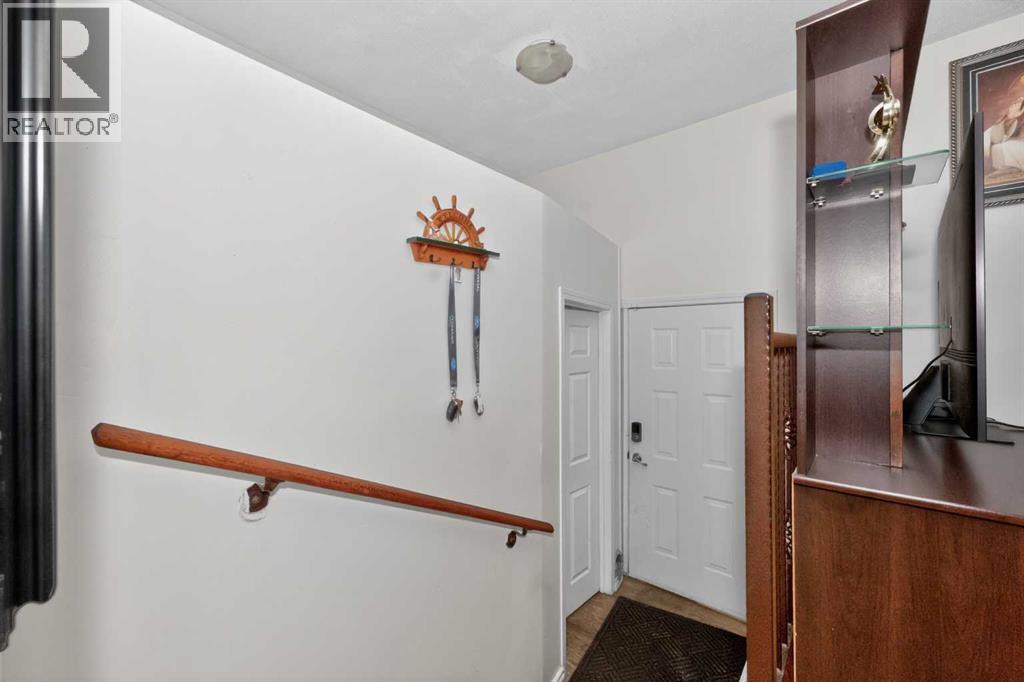 119 Taravista Drive NE, Calgary, Alberta  t3j 4t2 - Photo 4 - A2305731