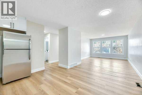 8, 75 Templemont Way Ne, Calgary, Alberta  T1Y 5K8 - Photo 4 - A2329775