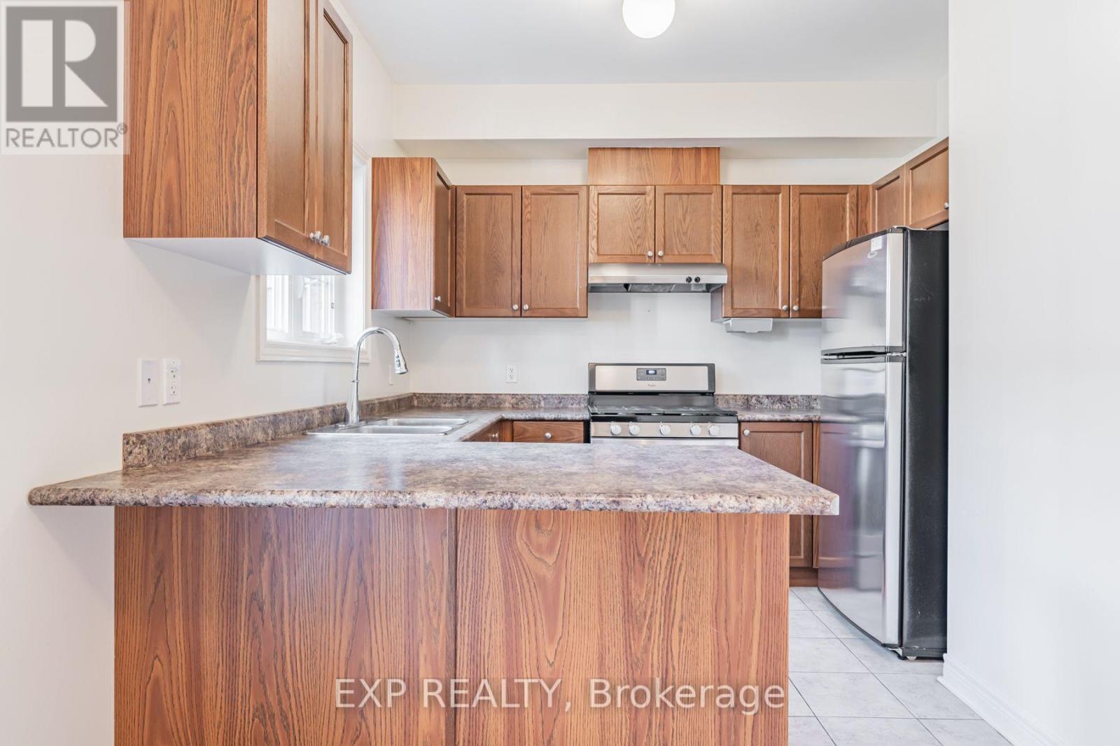 35 Carnahan Terrace, Toronto, Ontario  M4E 0B1 - Photo 12 - E13609688