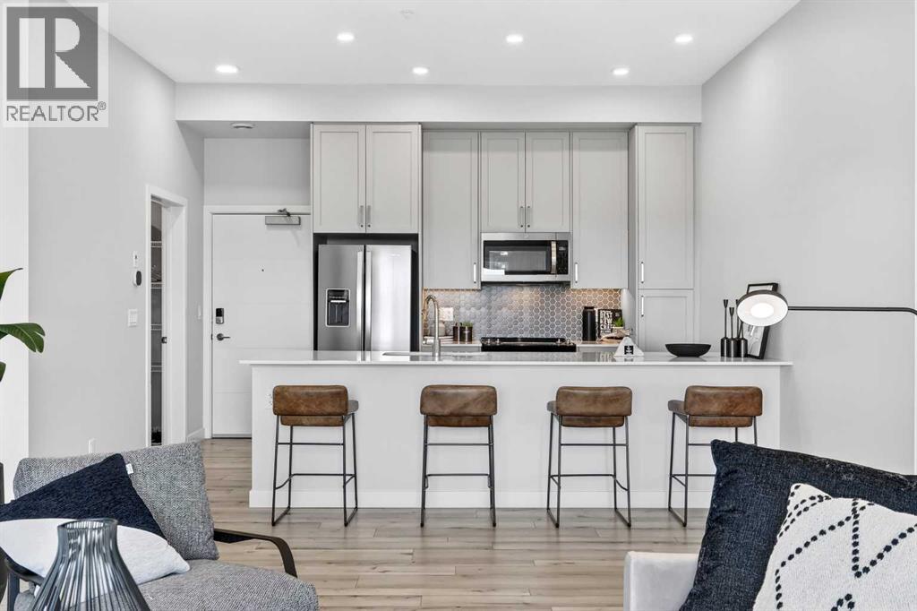 410, 255 Les Jardins Park Se, Calgary, Alberta  T2C 5W9 - Photo 1 - A2316225