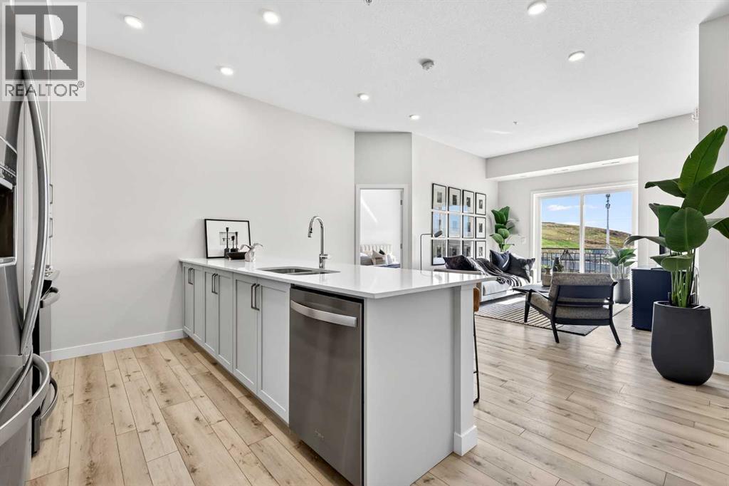 410, 255 Les Jardins Park Se, Calgary, Alberta  T2C 5W9 - Photo 3 - A2316225