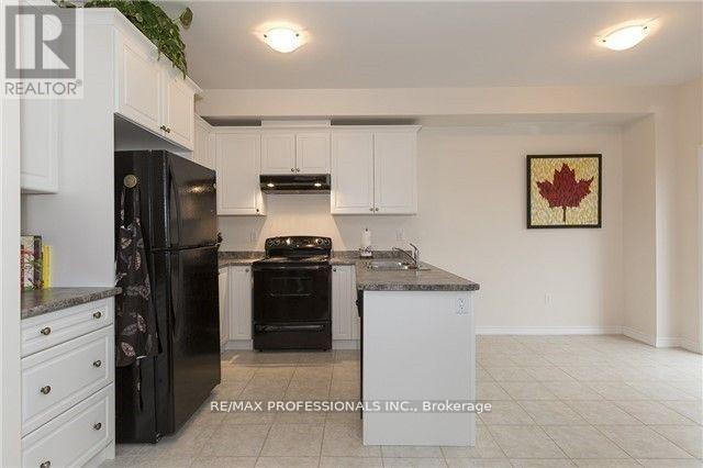 650 Murray Meadows Place, Milton, Ontario  L9T 8L7 - Photo 7 - W13610752