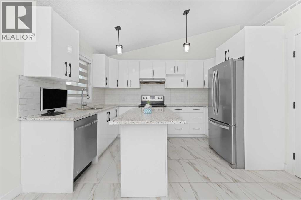 98 Del Ray Road Ne, Calgary, Alberta  T1Y 6V6 - Photo 6 - A2331214