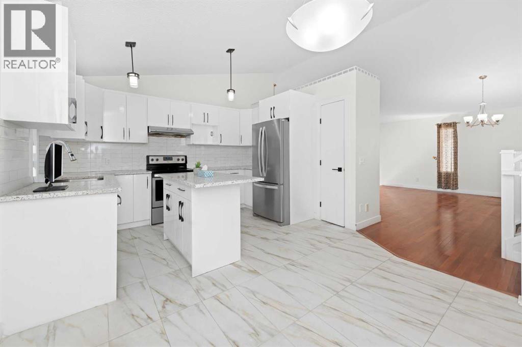 98 Del Ray Road Ne, Calgary, Alberta  T1Y 6V6 - Photo 7 - A2331214