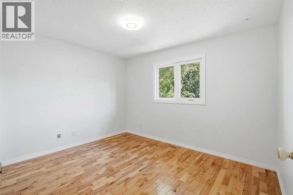 6119 Blackthorn Crescent Ne, Calgary, Alberta  T2K 3X5 - Photo 11 - A2319934