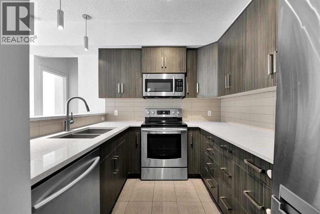 107, 611 Edmonton Trail Ne, Calgary, Alberta  T2E 3J3 - Photo 2 - A2315986