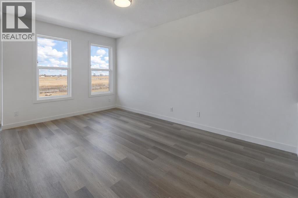 1481 South Point Villas SW, Airdrie, Alberta  T4B 5P2 - Photo 9 - A2303379