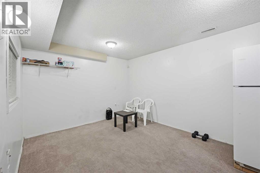 33 Saddlecrest Close NE, Calgary, Alberta  T3J 5B5 - Photo 33 - A2327223
