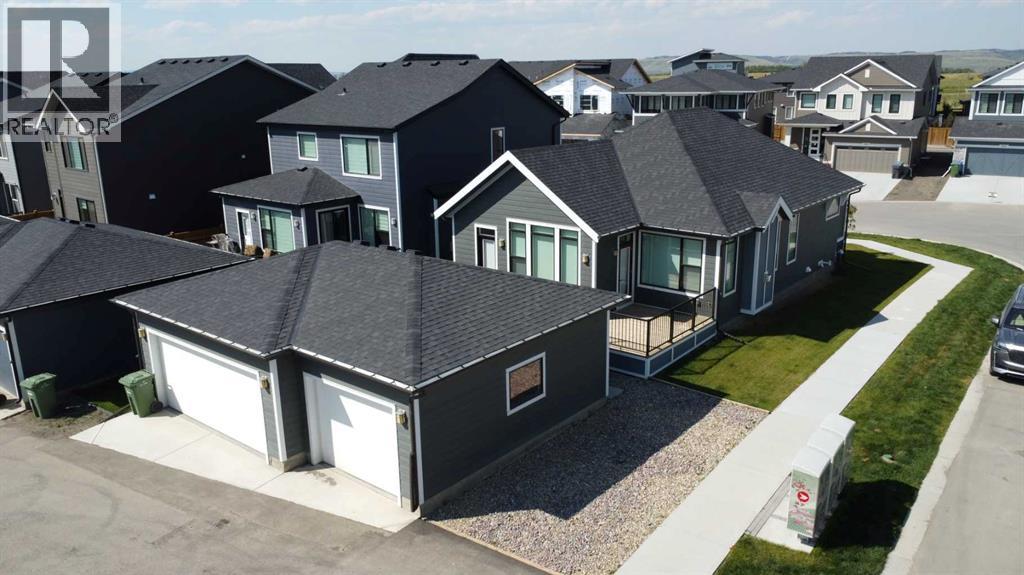 568 Grayling Bend, Rural Rocky View County, Alberta  T3Z 0H6 - Photo 3 - A2309092