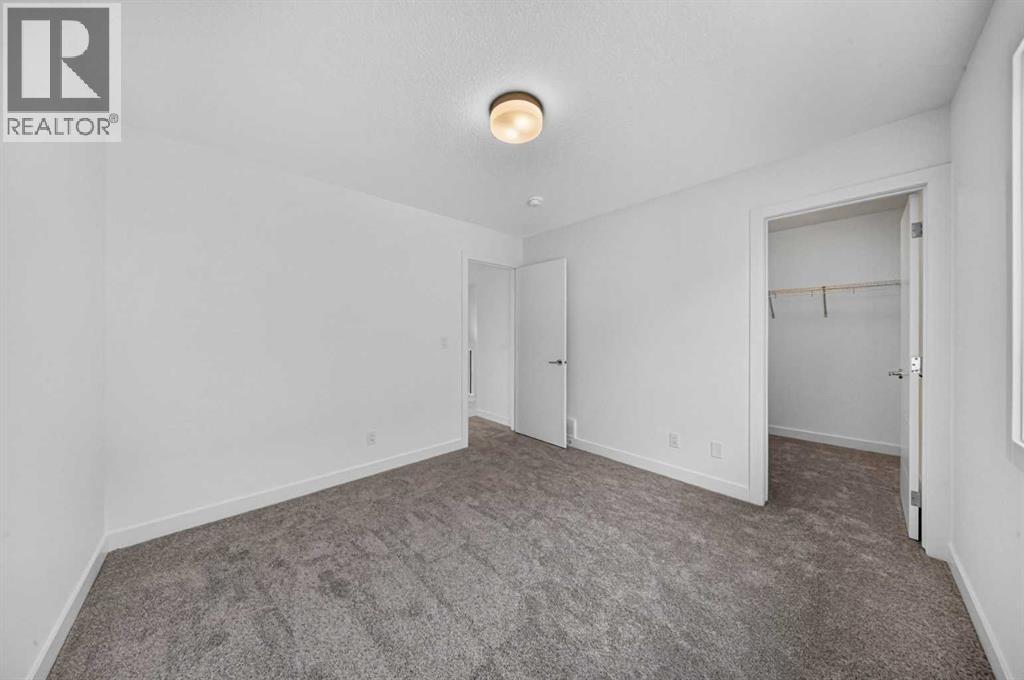 1408 South Point Villas SW, Airdrie, Alberta  T4B 5P2 - Photo 25 - A2330769