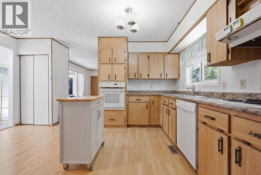 3011 Burroughs Manor NE, Calgary, Alberta  T1Y 6K1 - Photo 15 - A2326628