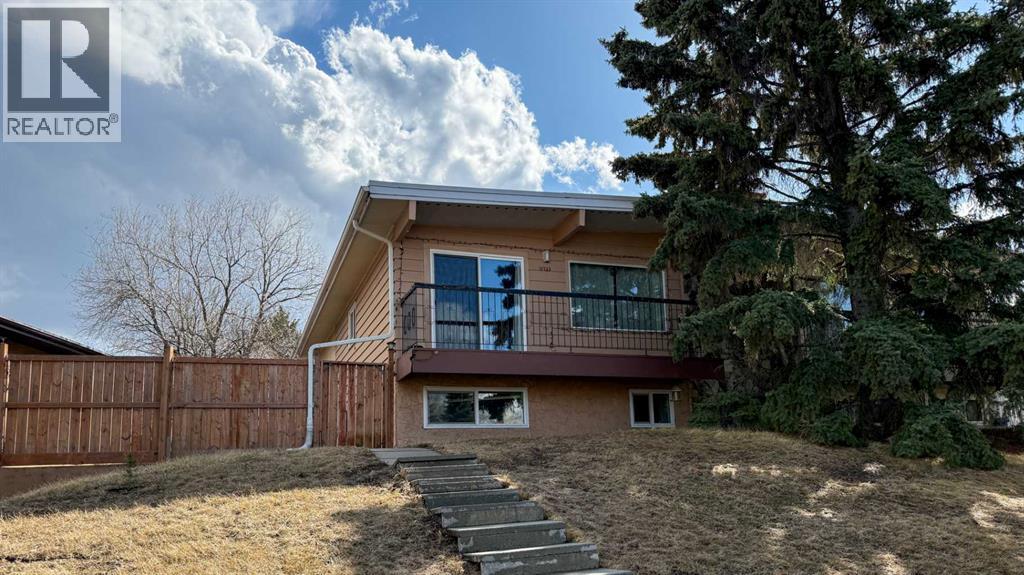 11723 Canfield Road Sw, Calgary, Alberta  T2W 1J6 - Photo 1 - A2303589