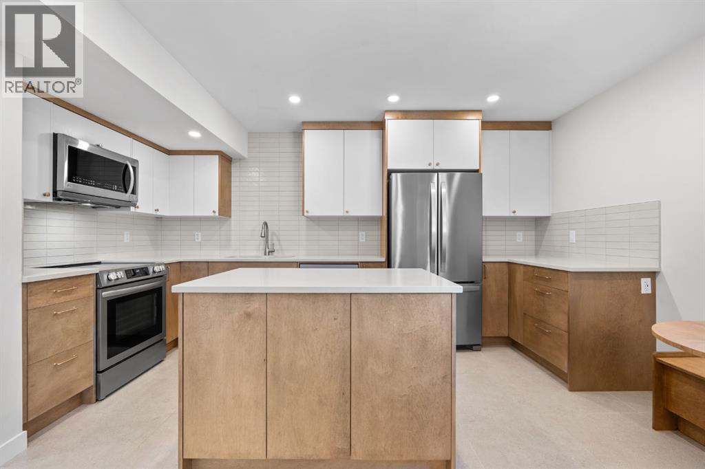 411, 6223 31 Avenue NW, Calgary, Alberta  T3B 3X2 - Photo 2 - A2329226