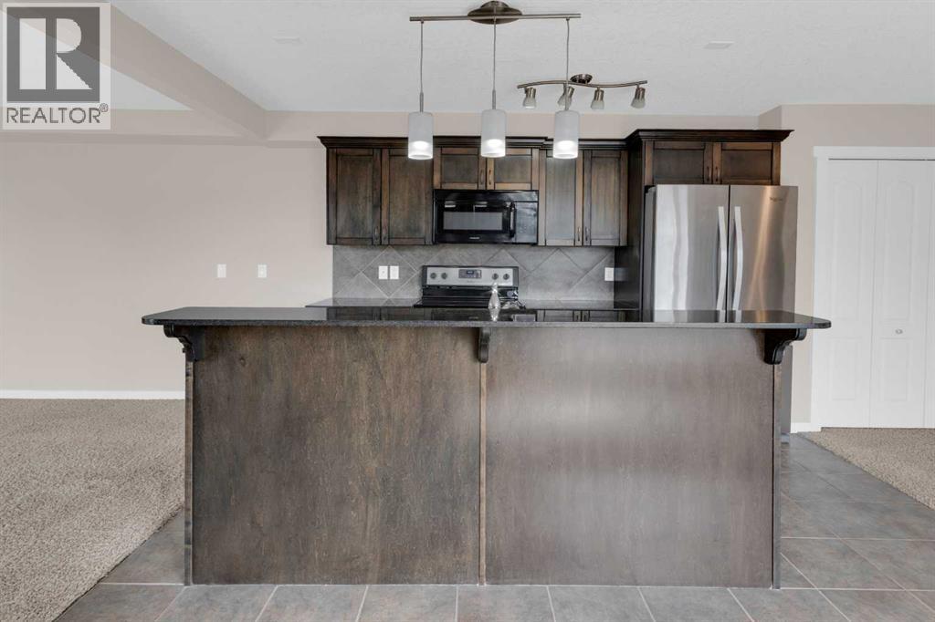 304, 141 Mountain Street, Cochrane, Alberta  T4C 1Z5 - Photo 11 - A2332611
