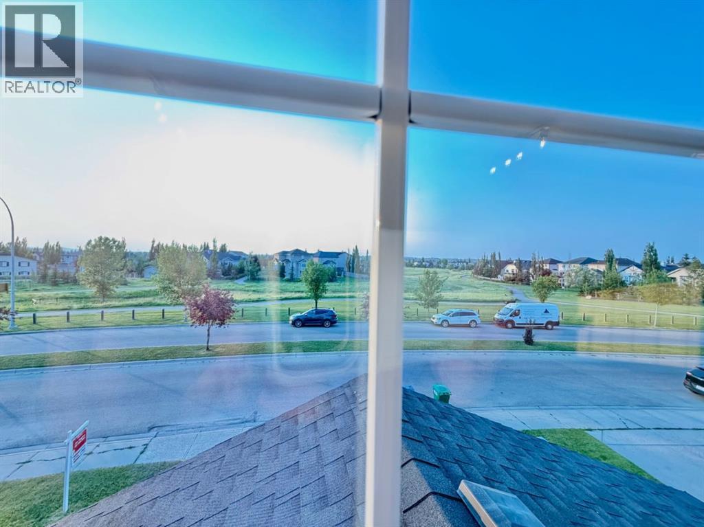 105 Cimarron Park Circle, Okotoks, Alberta  T1S 2H5 - Photo 9 - A2311097