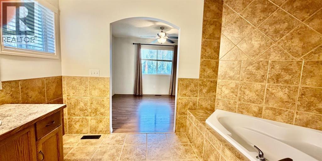 105 Cimarron Park Circle, Okotoks, Alberta  T1S 2H5 - Photo 13 - A2311097