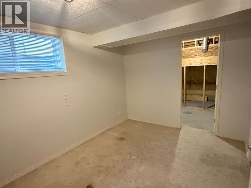 105 Cimarron Park Circle, Okotoks, Alberta  T1S 2H5 - Photo 33 - A2311097