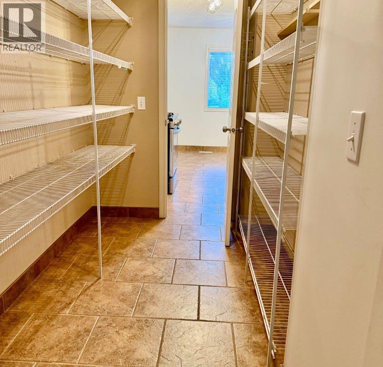105 Cimarron Park Circle, Okotoks, Alberta  T1S 2H5 - Photo 19 - A2311097