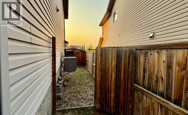 105 Cimarron Park Circle, Okotoks, Alberta  T1S 2H5 - Photo 23 - A2311097