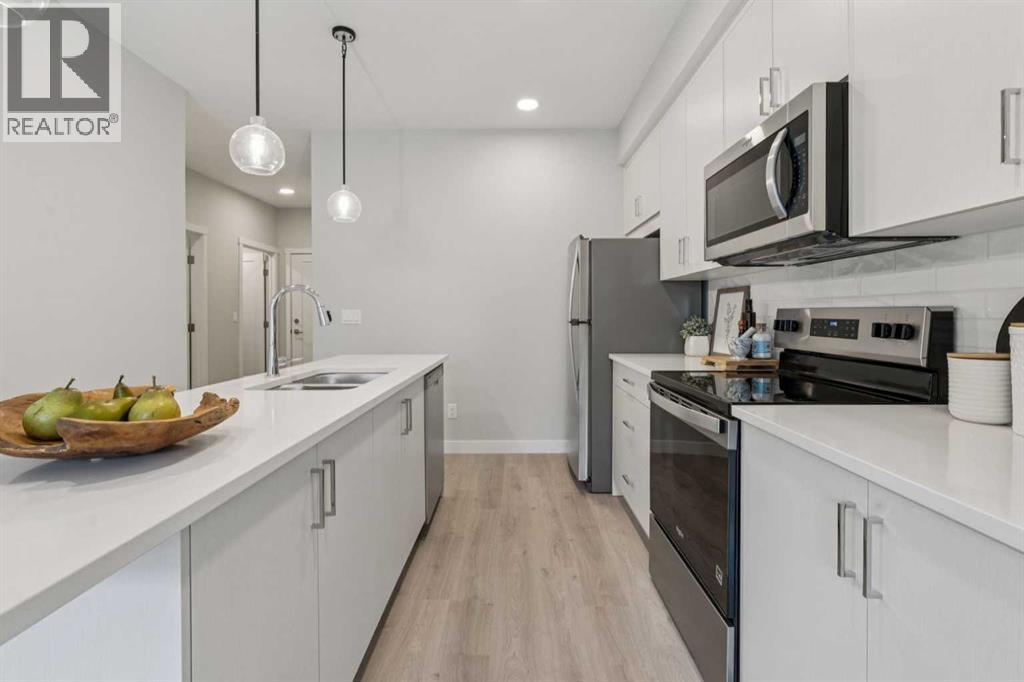 201, 655 Shawnee Square Sw, Calgary, Alberta  T2Y 1E3 - Photo 4 - A2301252