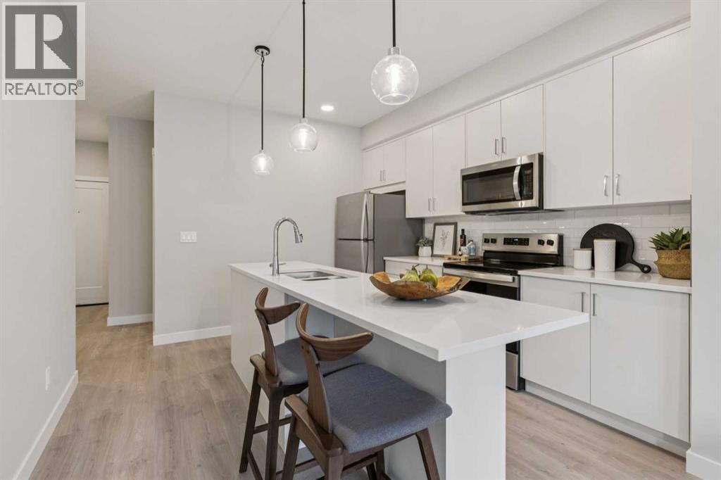 201, 655 Shawnee Square Sw, Calgary, Alberta  T2Y 1E3 - Photo 3 - A2301252