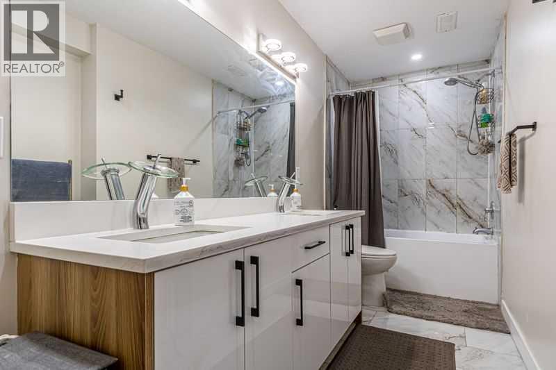 8389 Saddleridge Drive Ne, Calgary, Alberta  T3J 4W9 - Photo 28 - A2331440