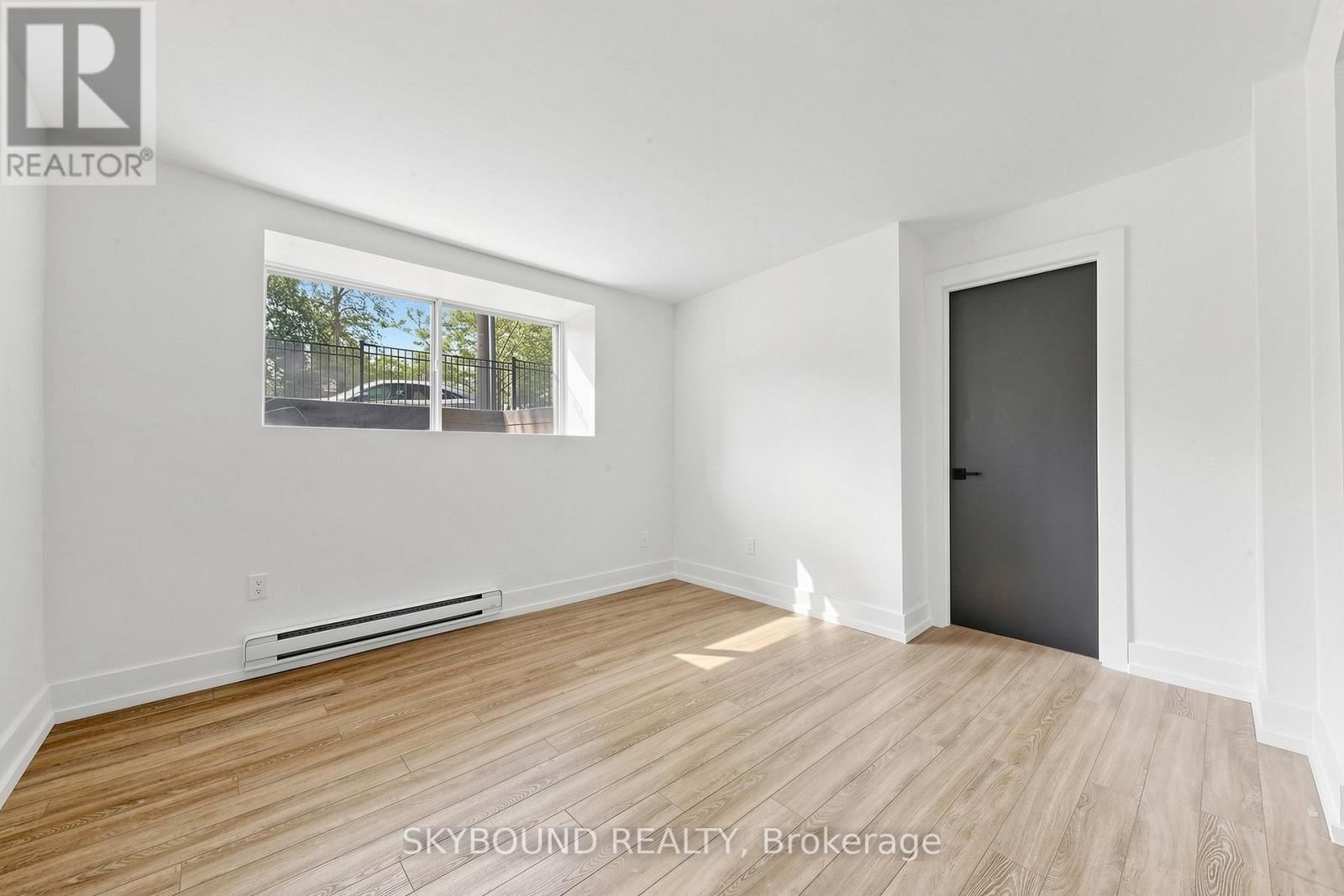 B - 139 Wineva Avenue, Toronto, Ontario  M4E 2T3 - Photo 2 - E13614524