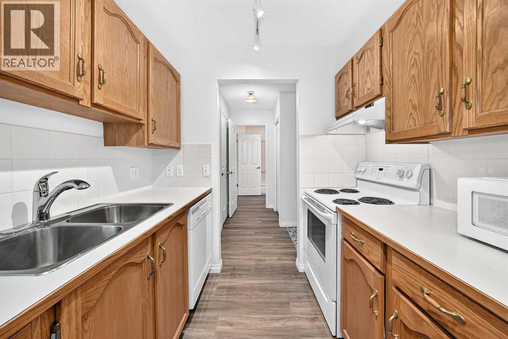 307, 309 Woodside Drive Nw, Airdrie, Alberta  T4B 2E7 - Photo 10 - A2330737