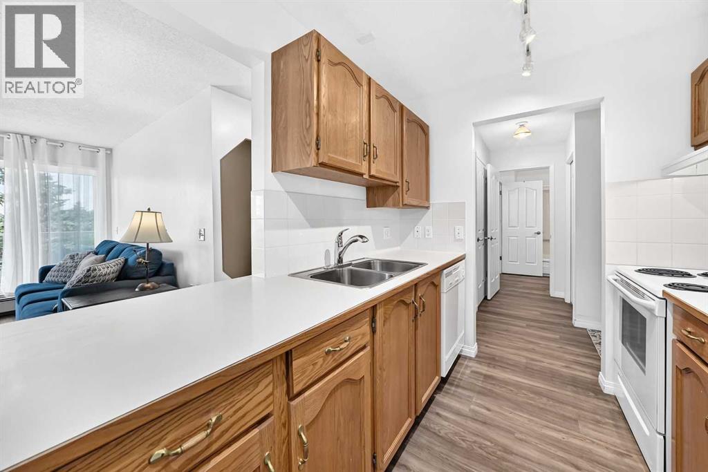 307, 309 Woodside Drive Nw, Airdrie, Alberta  T4B 2E7 - Photo 9 - A2330737