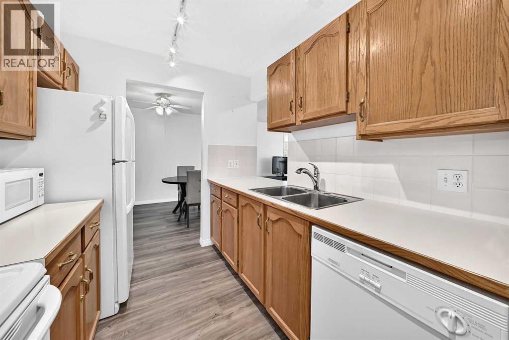 307, 309 Woodside Drive Nw, Airdrie, Alberta  T4B 2E7 - Photo 8 - A2330737