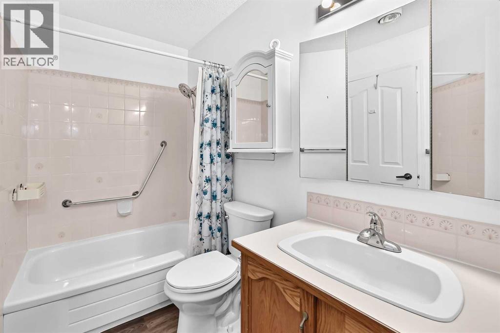 307, 309 Woodside Drive Nw, Airdrie, Alberta  T4B 2E7 - Photo 27 - A2330737